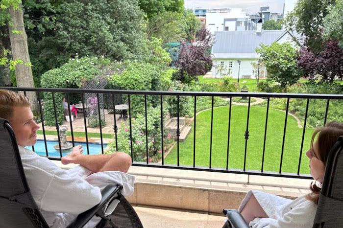 IMG_2740-1 Couple enjoying private balcony with view over garden at Oxford Healthcare Retreat South Africa